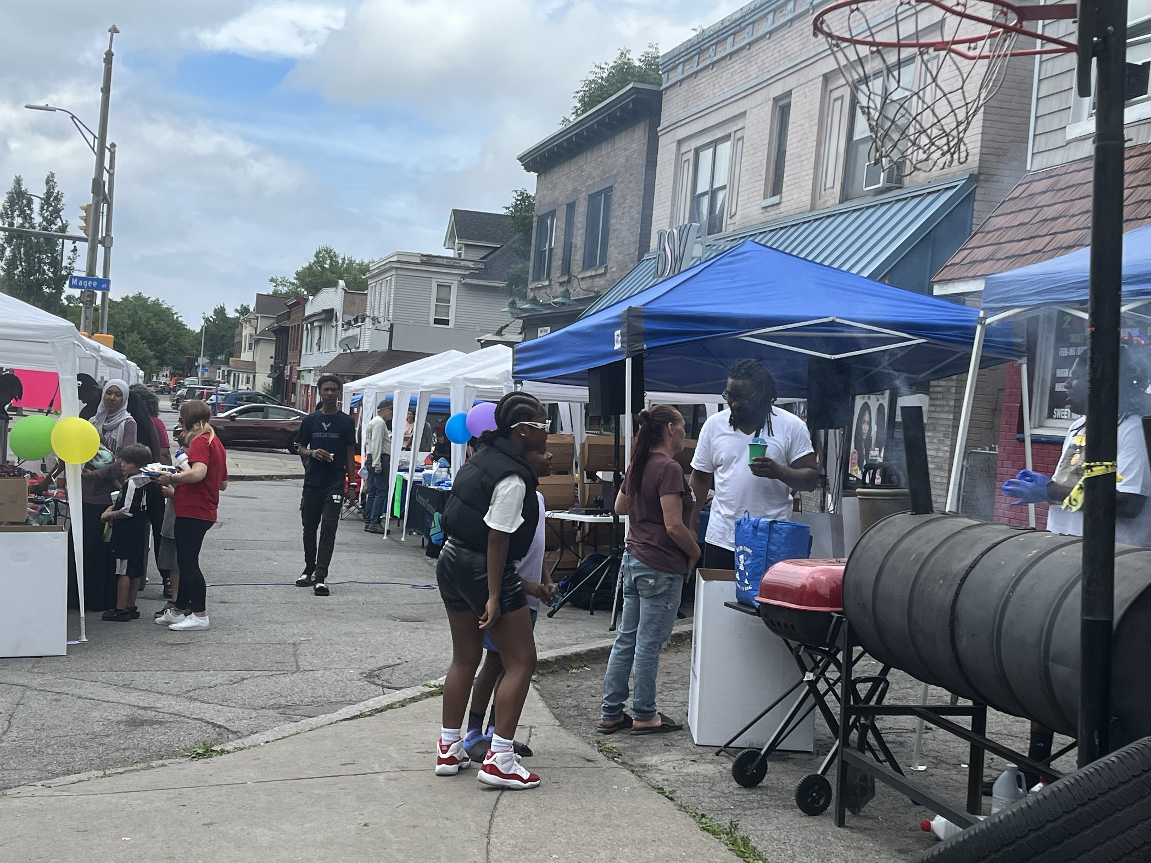 Juneteenth Freedom Resource Festival Tents, Grill, and People