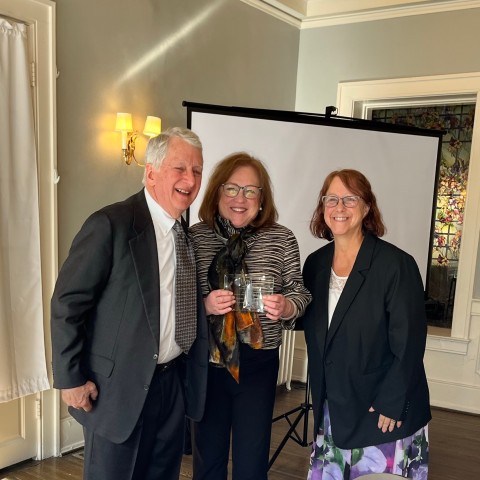 Interim Executive Director Terry Hartmann, new Coterie Member Dianne Cooney-Miner, and board member Amy Kahn smile.